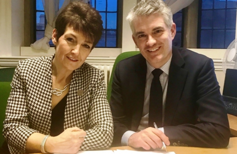 Jo Churchill and James Cartlidge have signed the agreement to develop more homes.